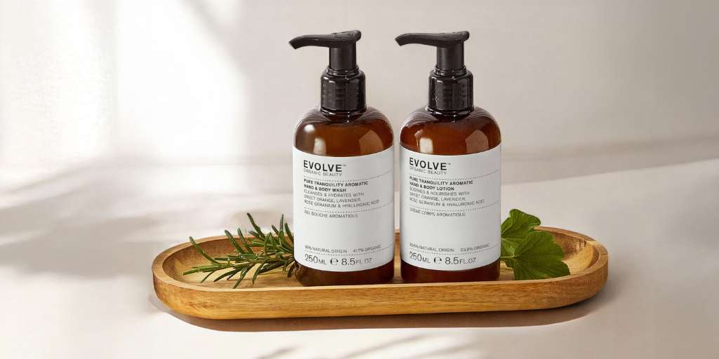 Pure Tranquility Hand & Body Wash on a wooden tray with foilage
