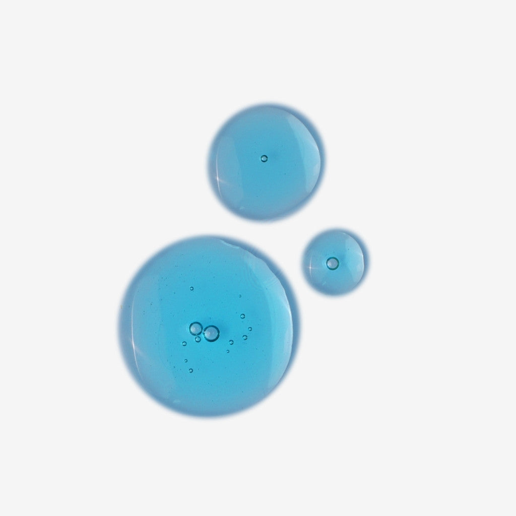 Blue oil like swatch showing texture of Blue Velvet Ceramide Serum