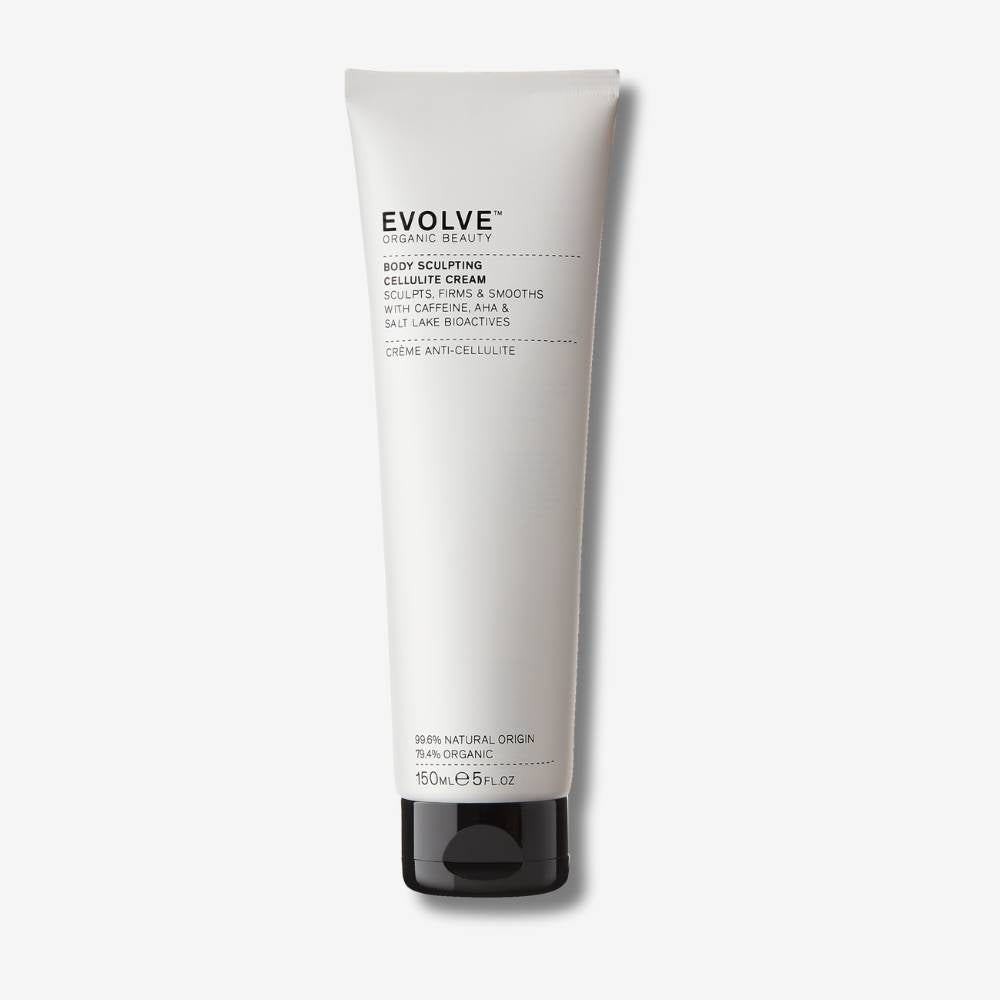 Evolve Organic Beauty Body Sculpting Cellulite Cream in white sugar cane squezable tube with black plastic lid on off white background with shadow behind