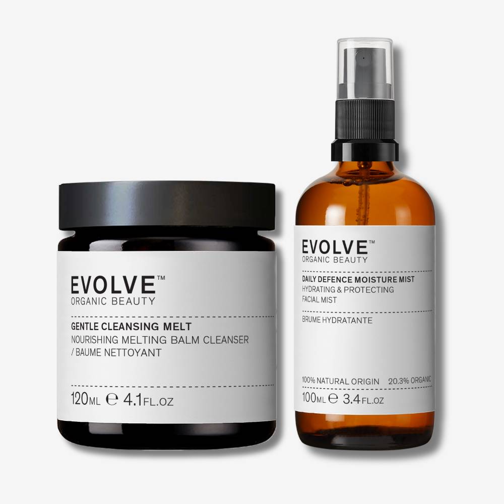 evolve organic beauty packshots of gentle cleansing melt next to daily defence moisture mist on off white background