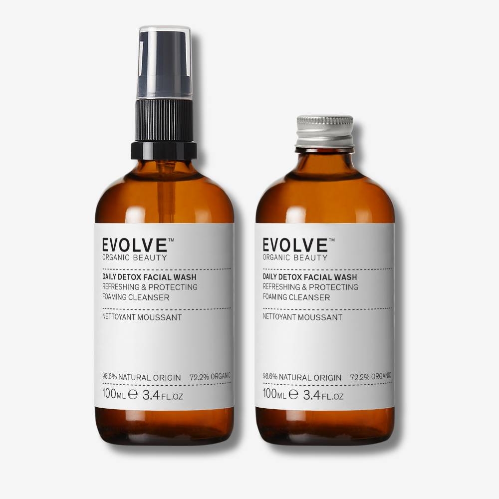 evolve organic beauty packshot of daily detox facial wash with black pump lid next to daily detox facial wash with recycled metal lid on off white background