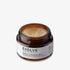Evolve Organic Beauty Gentle Cleansing Melt in a travel size brown jar opened showing its balmy texture on off white background with shadow beind