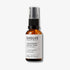 Evolve Organic Beauty Liquid Radiance Glycolic Toner in brown glass bottle with black pump lid on off white background with shadow behind