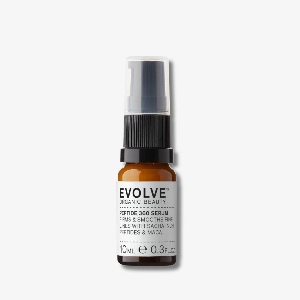 Evolve Organic Beauty Peptide 360 serum in brown glass bottle with black pump lid on off white background with shadow behind
