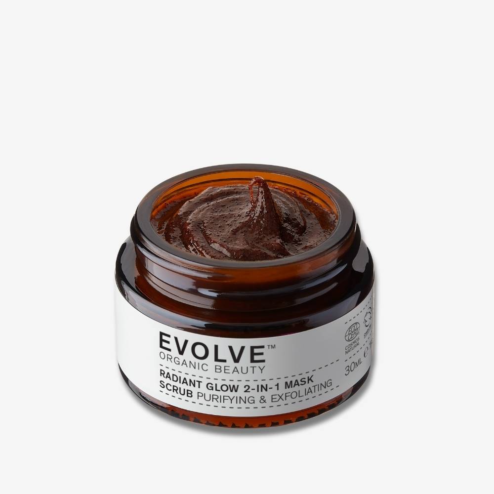 evolve organic beauty open amber jar showing chocolate texture of travel sized radiant glow 2-in-1 mask scrub