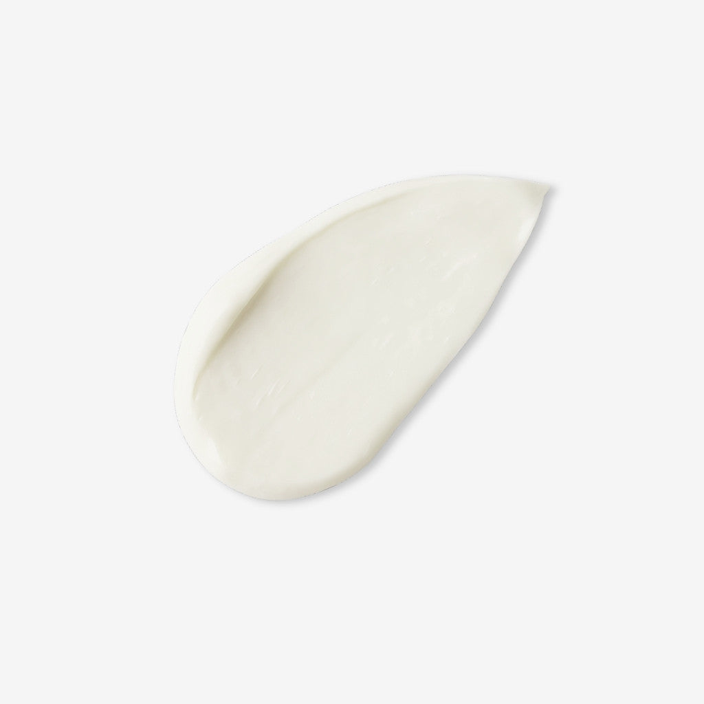 Up close cream/ lotion texture swatch of Sunless Glow 3-in-1 Gradual Tan