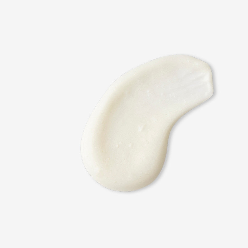 swatch of the texture of Superfood Shine Conditioner on an off-white background