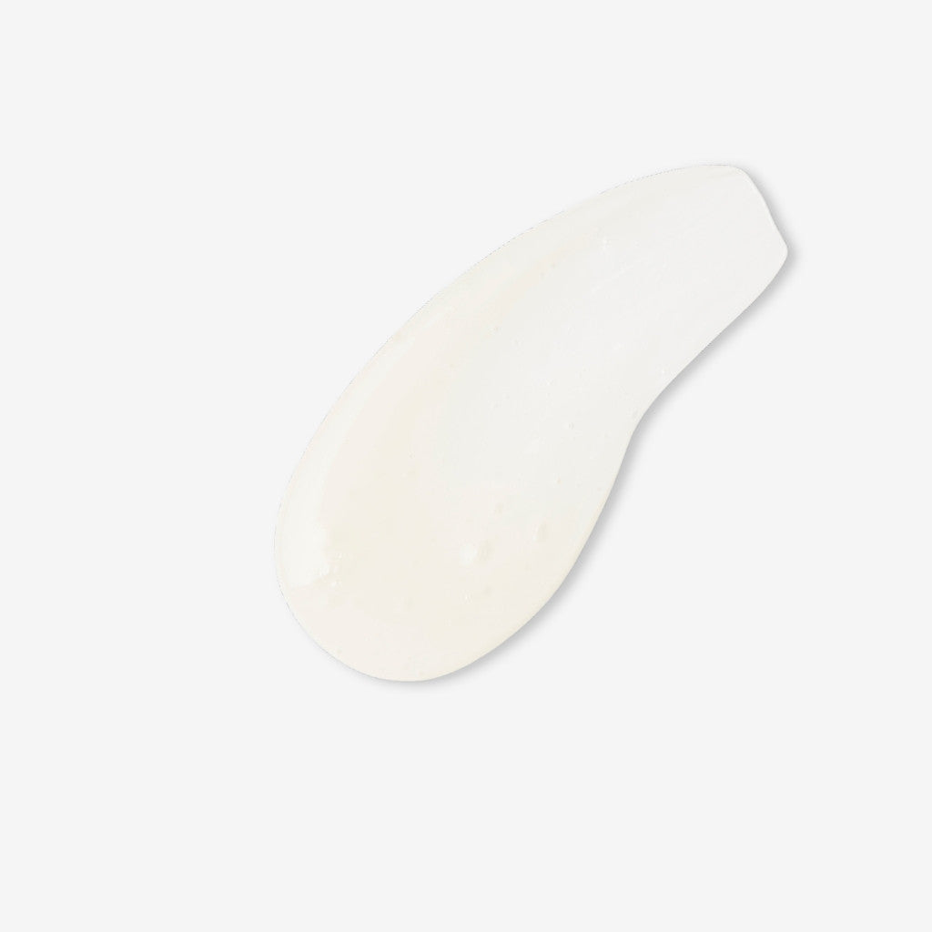 Swatch showing the texture of Superfood Shine Shampoo on an off-white background