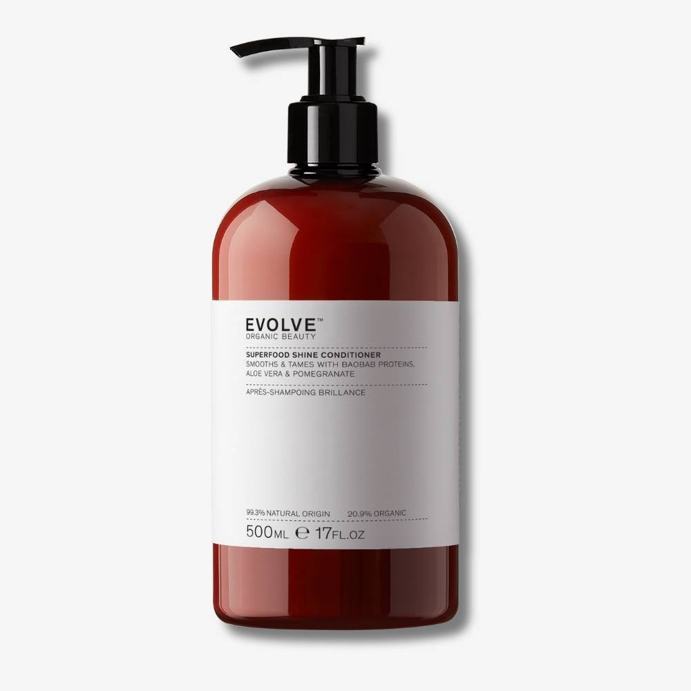 Evolve Organic Beauty Superfood Shine Conditioner Supersize 500ml bottle with black pump lid on off-white background with shadow behind
