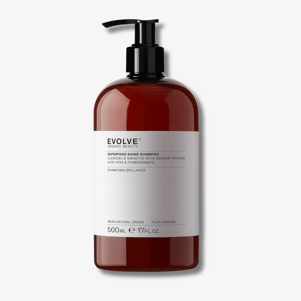 Evolve Organic Beauty Superfood Shine Shampoo Supersize 500ml brown bottle with black pump lid on off-white background with shadow behind