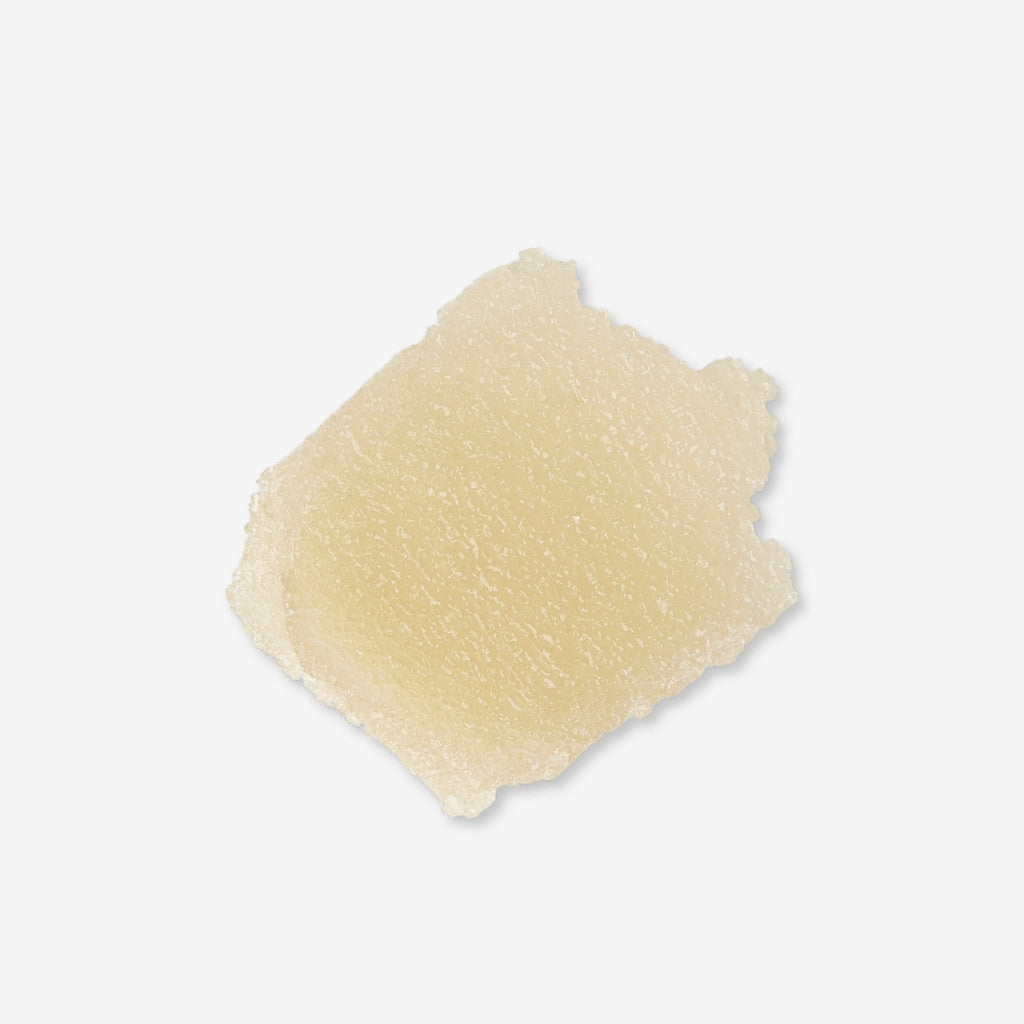 Yellow sugar scrub swatch showing texture of tropical blossom body piolish