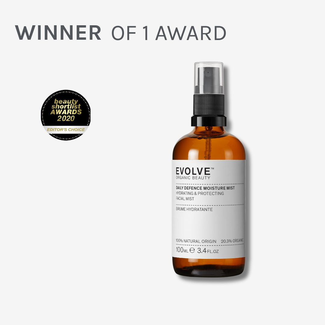 image of timeless renewal body oil surrounded by awards the product has won