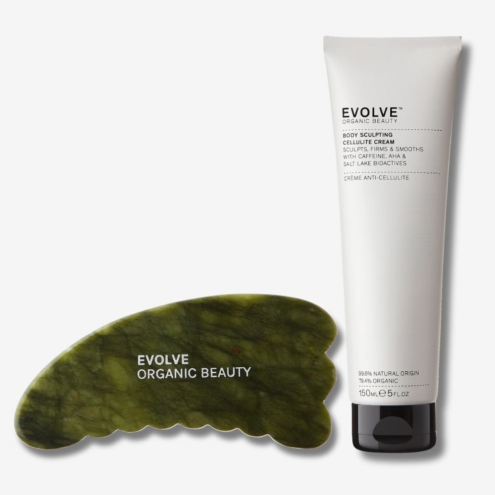 Body sculpting duo including packshots of Green Jade Body Gua Sha ad Body Sculpting Cellulite Cream with shadows on off white background