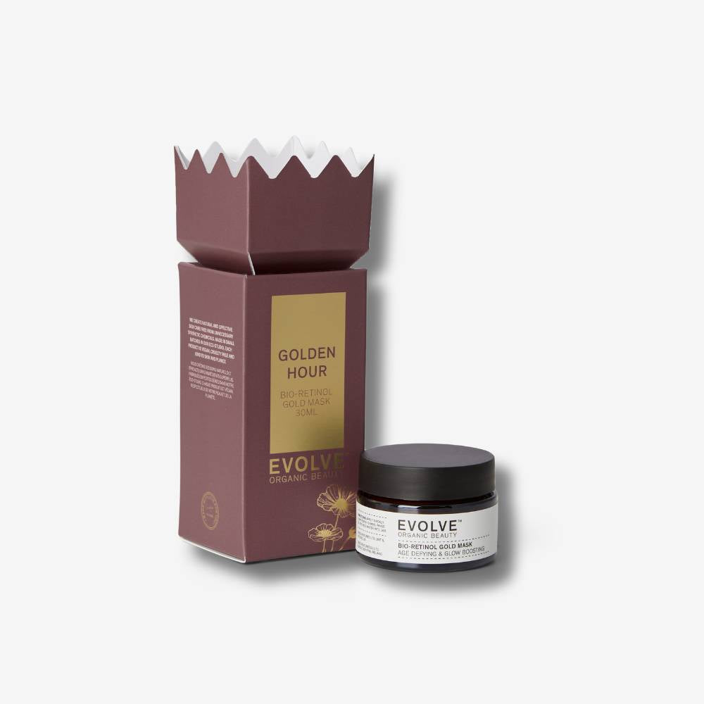 Evolve organic beauty bio-retinol gold mask with christmas packaging on a white background