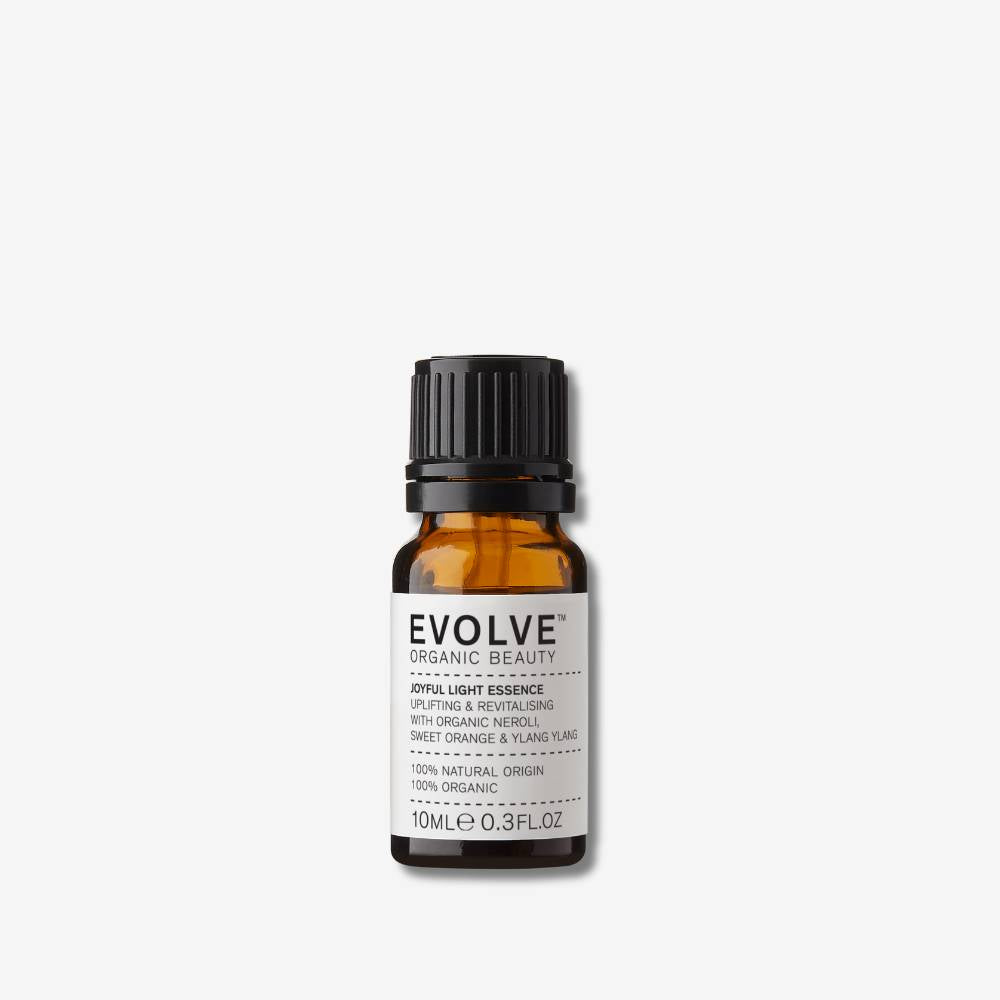 Evolve organic beauty essential oil bottle on a white background