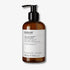 Evolve Organic Beauty Joyful Light Hand & Body Wash in brown prevented ocean plastic bottle with black pump on off white background with shadow behind