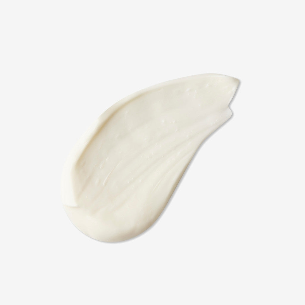 white creamy swatch showing texture of pure tranquility lotion