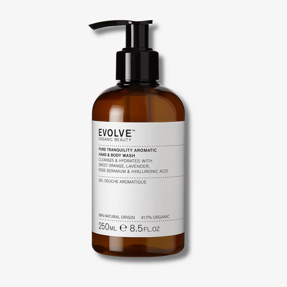 Evolve Organic Beauty Pure tranquility aromatic hand and body wash in brown prevented ocean plastic bottle with black pump lid on off white background with shadow behind