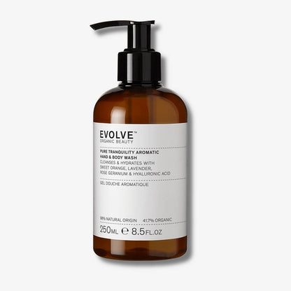 Evolve Organic Beauty Pure tranquility aromatic hand and body wash in brown prevented ocean plastic bottle with black pump lid on off white background with shadow behind