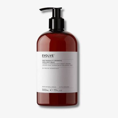 Evolve Organic Beauty Pure tranquility aromatic hand and body was Supersize in brown  plastic bottle with black pump lid on off white background with shadow behind