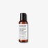 Evolve Organic Beauty Pure tranquility aromatic hand and body wash travel size in brown  with black lid on off white background with shadow behind