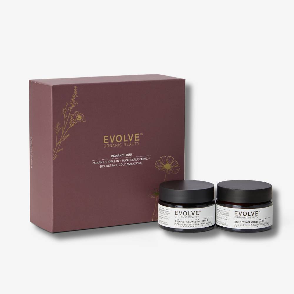 Evolve organic beauty radiance duo with two jars and a box on a white backgroun