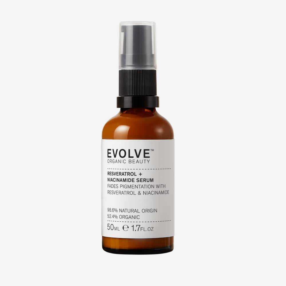 Evolve Organic Beauty Resveratrol + Niacinamide Serum in brown glass bottle with black pump lid on off white background with shadow behind