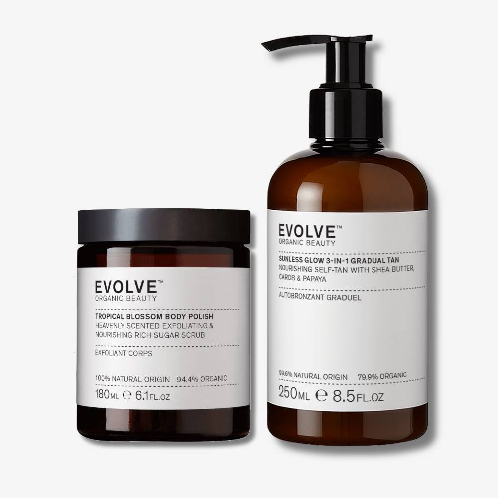 evolve organic beauty packshot of tropical blossom body polish next to sunless glow 3-in-1 gradual tan on off white background