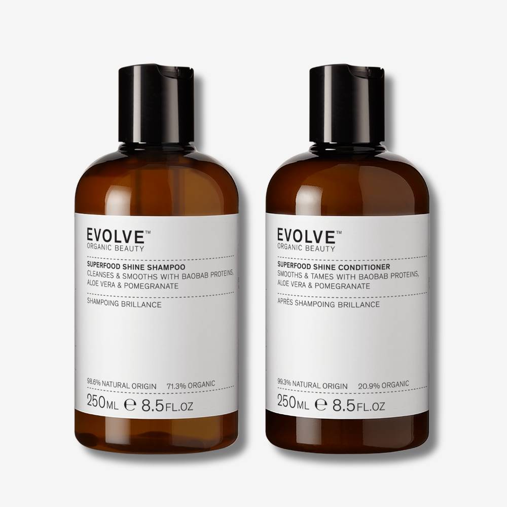 evolve organic beauty packshot of superfood shine shampoo and super shine conditioner on off white background