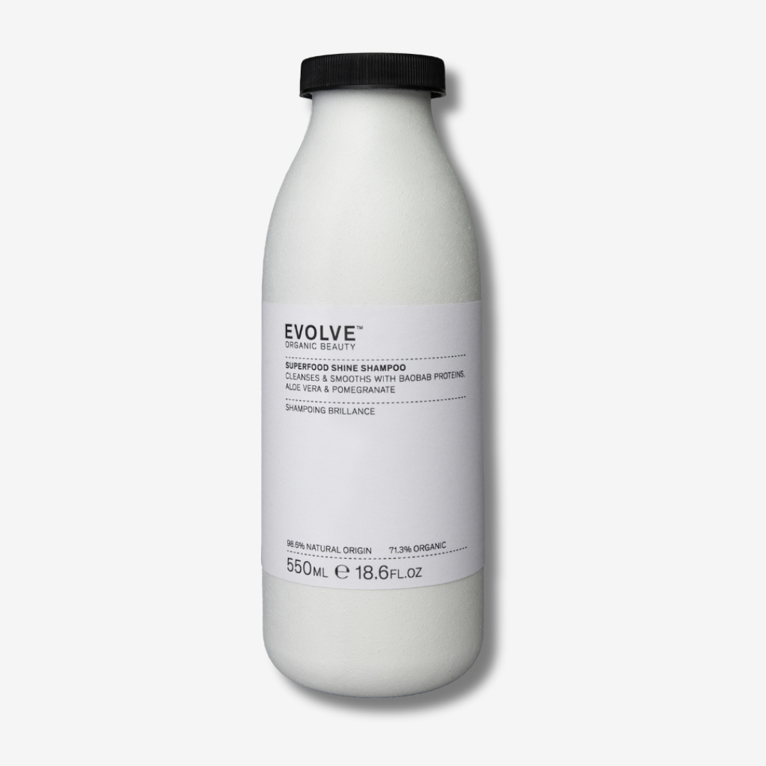 Evolve Organic superfood shine shampoo wash i first-ever commercial refill products in their sustainable fibre-based bottles on off white background with shadow behind