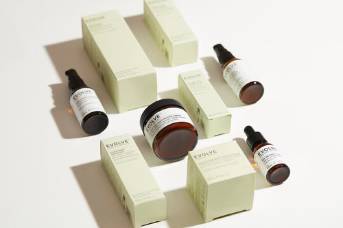 evolve organic beauty green recyclable packaging flatlay